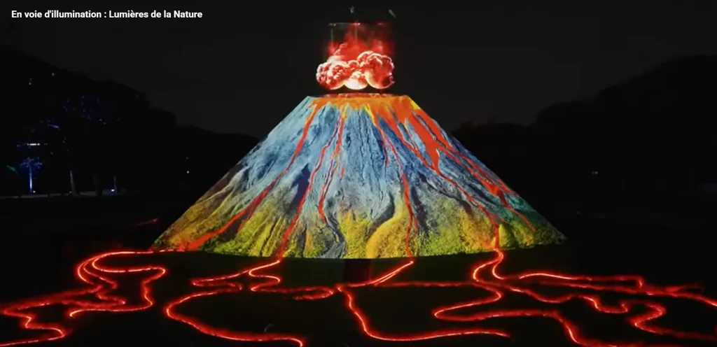 Waterproof holographic fan creating volcanic eruption effect at Jardin des Plantes Paris night exhibition